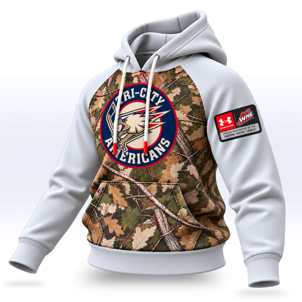 A white and camouflage pullover hoodie featuring a large 'Tri-City Americans' logo on the chest and a 'Work Hard' Under Armour patch on the right sleeve, shown on a light gray background.